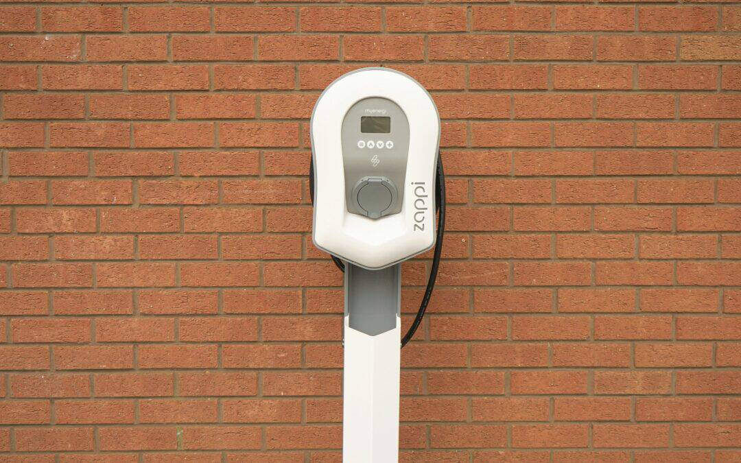 EV Charger against a brick wall